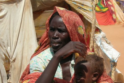 A displaced woman and child in Darfur.
