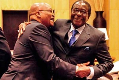 Presidents Jacob Zuma and Robert Mugabe at a regional Southern Africa summit: