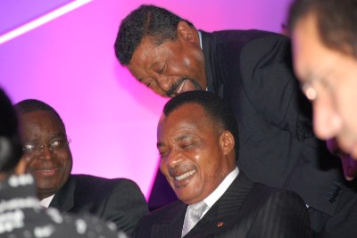 Ping shares a laugh with President Denis Nguesso of the Republic of Congo.