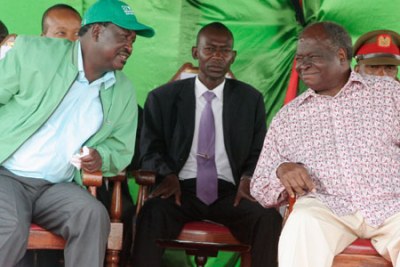 President Kibaki (right) and Prime Minister Raila Odinga (left).