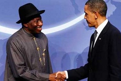Presidents Goodluck Jonathan and Barack Obama shake hands at the Nuclear Security Summit in Washington in 2010 (file photo).
