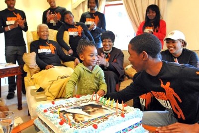 Nelson Mandela celebrates his 93rd birthday on July 18, 2011, in Qunu with members of his family.