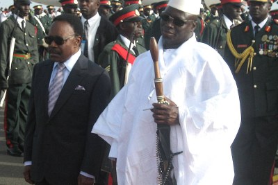 Gambian President Yahya Jammeh, right, with the late President Omar Bongo of Gabon.