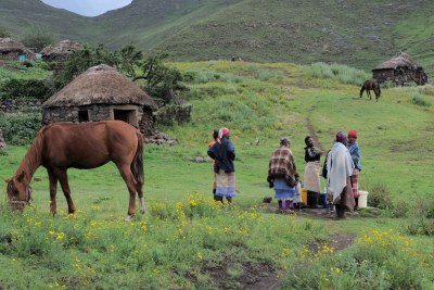 Women collect water from a communal tap in the village of Ha Rantismane in Lesothos mountainous Thaba-Tseka District (file photo).