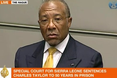 Al Jazeera television news records the moment Charles Taylor was sentenced to 50 years' jail by the Special Court for Sierra Leone in The Hague on Wednesday.