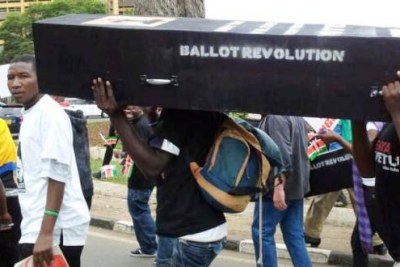 Protesters carrying a coffin symbolizing one of Kenya's many scandals.