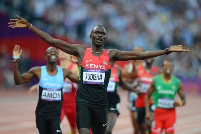 David Rudisha of Kenya broke his own world record to win the 800m gold medal, while Nigel Amos of Botswana, left, took silver and Timothy Kitum of Kenya, obscured behind Rudisha, won the bronze.