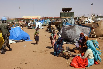 Sudanese Refugees (file photo): The government accuses rebels of looting and kidnapping in Darfur.