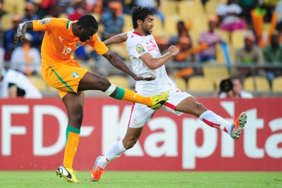 African Footballer of the Year Yaya Toure scoring one of Cote d'Ivoire's goals against Tunisia.