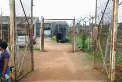The broken gate of Olokuta Medium Prison, Akure, Ondo State.
