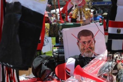 Opponents of President Mohamed Mursi rallied in Tahrir Square on Sunday, 30 June, 2013, to demand his removal and call for early presidential elections.
