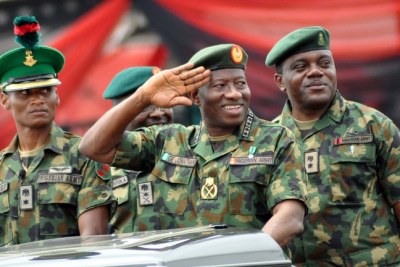 President Goodluck Jonathan (centre) inspecting parade during the Nigerian Army Day Celebration in Abuja (file photo).