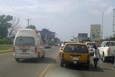 Ambulances ferry suspected Ebola patients in Monrovia.
