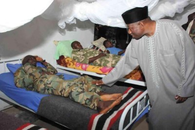 President Goodluck Jonathan with injured soldiers.