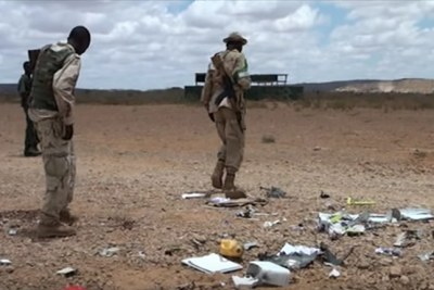 Six people have been wounded after a laptop bomb exploded at an airport in Somalia.