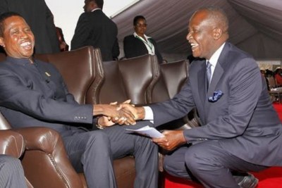 From left, President Edgar Lungu chats with Felix Mutati (file photo).