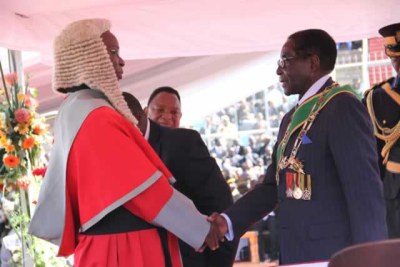 President Robert Mugabe and outgoing Chief Justice Godfrey Chidyausiku (file photo).