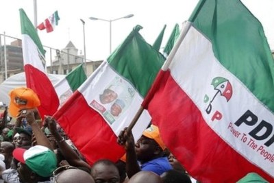 PDP supporters waving flags.