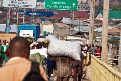 Traders crossing a bridge to DR Congo (file photo).