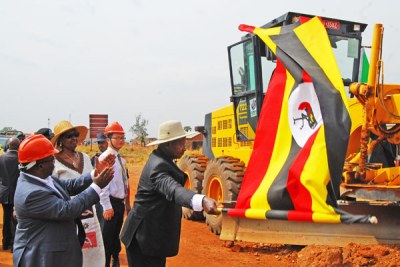 President Museveni flags off the Olwiyo-Gulu-Kitgum-Musingo road works at Anaka Town Council recently. The IMF plays an advisory role in many big infrastructural projects in the country.