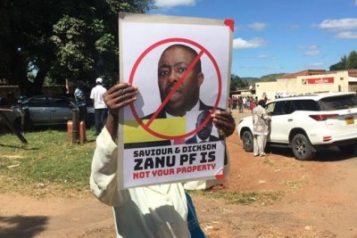 Zanu-PF supporters march against Saviour Kasukuwere.