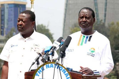 National Super Alliance co-principals Raila Odinga and Musalia Mudavadi address the media at Capitol Hill Square in Nairobi.
