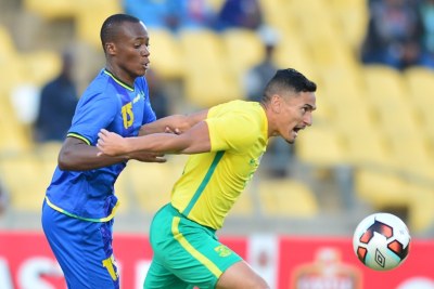 Cole Alexander of South African challenged by Raphael Loth of Tanzania during 2017 Cosafa Castle Cup match between South Africa and Tanzania.