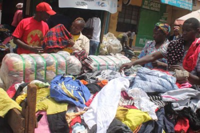 Second-hand clothes traders display their wares.