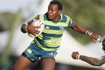 James Kilonzo evades a tackle during a Kenya Cup match at KCB grounds.