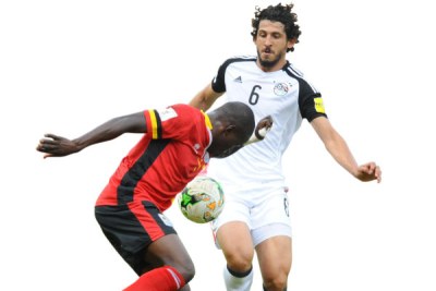Uganda’s Miya, left, will face Egypt’s Hegazy at Borg El Arab stadium tonight.