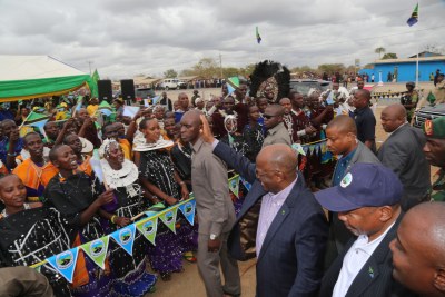 President John Magufuli joins officials to cut a ribbon to officially launch a 26km tarmac road linking Kilimanjaro International Airport and Mererani in Manyara Region.