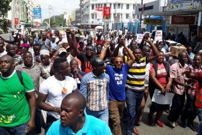 Nasa supporters march in the streets of Mombasa as they head to IEBC offices in the town.