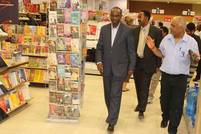 Former East African Community secretary general Richard Sezibera, Arusha Mayor Gaudence Lyimo and Nakumatt MD Atul Shah at the retailer’s Arusha branch.