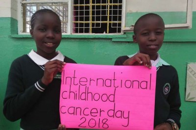 Pupils promote awareness on cancer during the International Childhood Cancer Day on February 15, 2018.