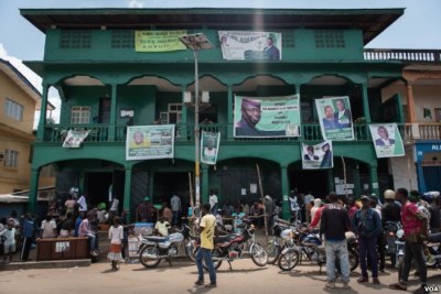 Campaign banners hang from the balconies of the Sierra Leone People's Party headquarters in Bo, Sierra Leone