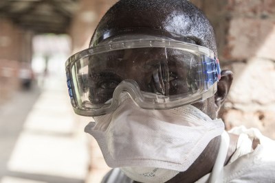 An Ebola health worker at Bikoro Hospital, Democratic Republic of the Congo.