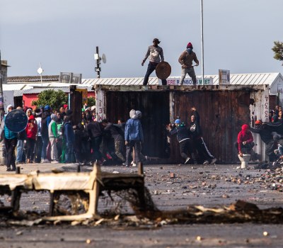 Photo Essay - Running Battles Over Land Occupation in Vrygrond, Cape Town