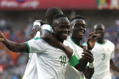 Sadio Mane of Senegal celebrating with his teammates after scoring the opening goal during their match with Japan in Ekaterinburg on June 24.
