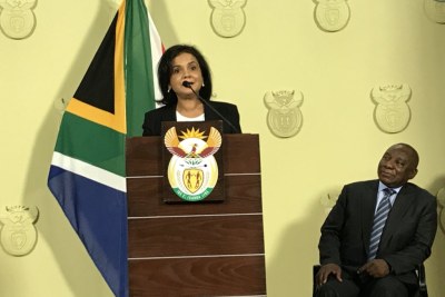 Advocate Shamila Batohi speaks beside President Cyril Ramaphosa after her appointment as the new head of the National Prosecuting Authority.