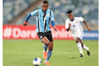 Mothusi Johnson of Botswana challenged by Tumelo Khutlang of Lesotho during the 2019 Cosafa Cup semifinals match between Lesotho and Botswana.