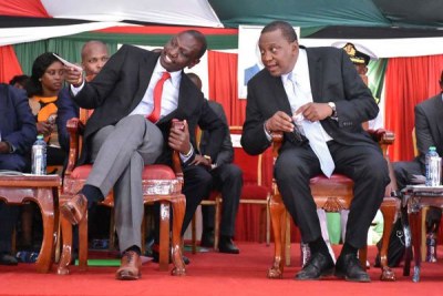 President Uhuru Kenyatta, right, with Deputy President William Ruto (file photo).