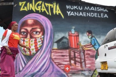 Graffiti in Tanzania raising awareness about Covid-19.
