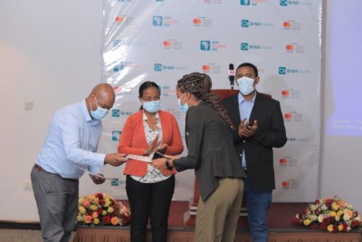 Pazion Cherinet, CEO, Orbit Health | Orbit Innovation Hub, handing over certificates to the graduates