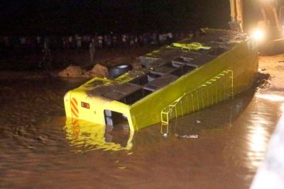 The wreckage of the bus that plunged into River Enziu in Mwingi, Kitui County in a picture taken on December 5, 2021.