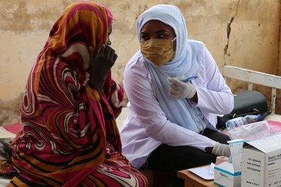 Two midwives work at a UNFPA-supported clinic in Sudan (file photo).