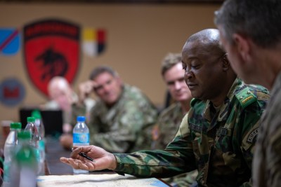 Brig. Gen. Moussa Barmou, Niger Special Operations Forces commander, meeting with  a U.S. Army Special Operations team to discuss anti-terrorism policy and tactics throughout the region, at Air Base 101 in Niger on June 12, 2023