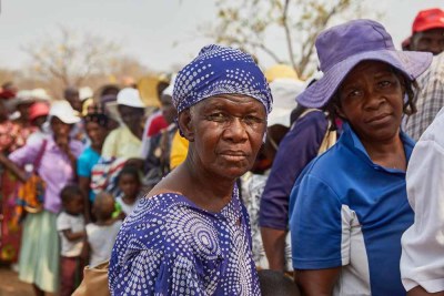 Two elderly women join other recipients, during the recent elephantiasis MDA in 7 districts of Zimbabwe, targeting 1.4 million people.